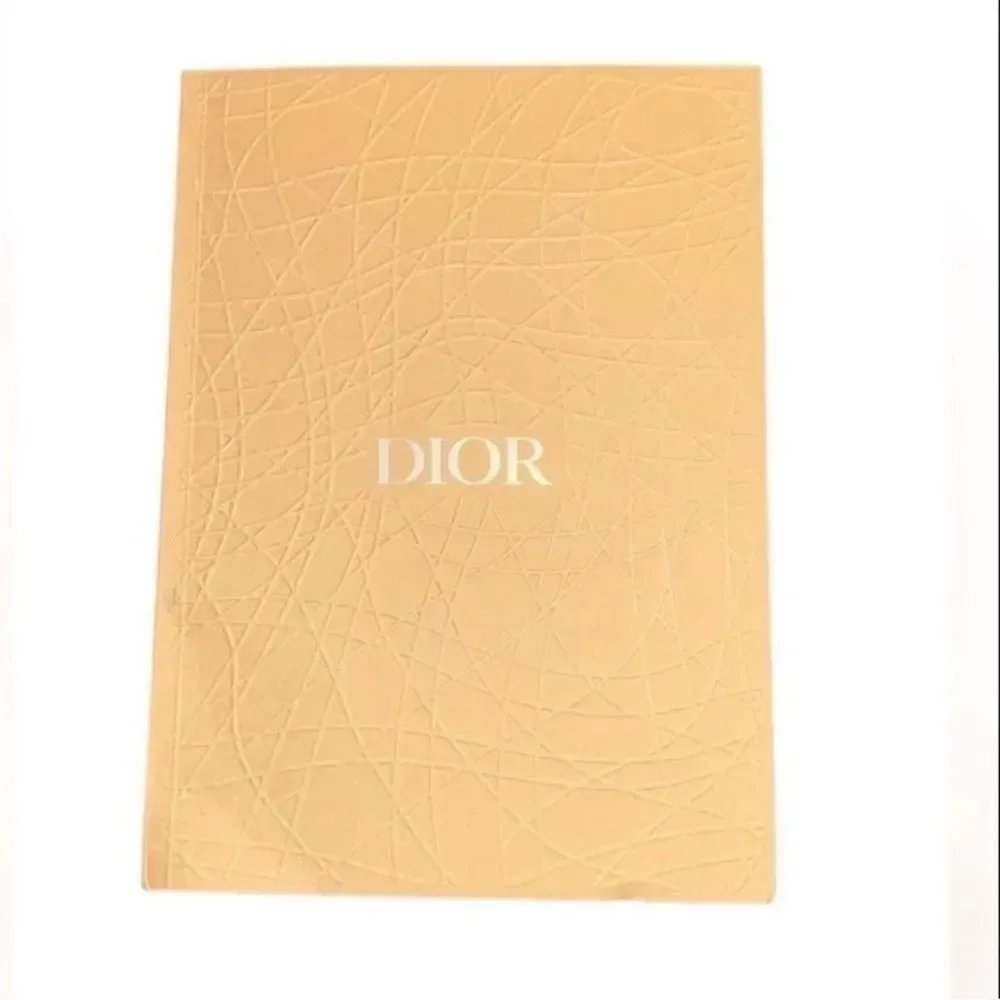 Christian Dior Tan Unlined Notebook.